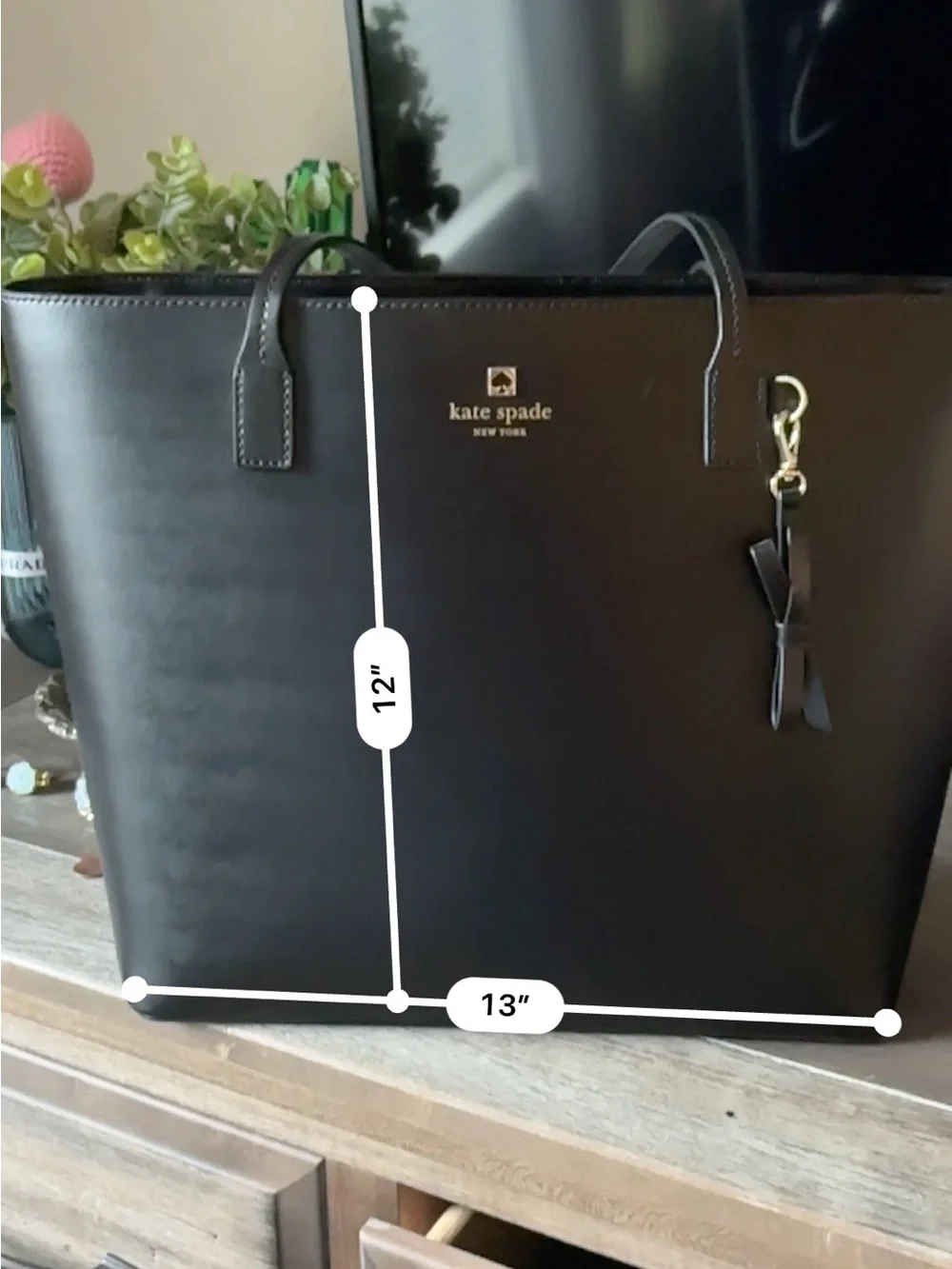 kate spade black leather tote with bow charm